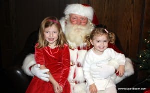 Charlotte and Lucy with Santa